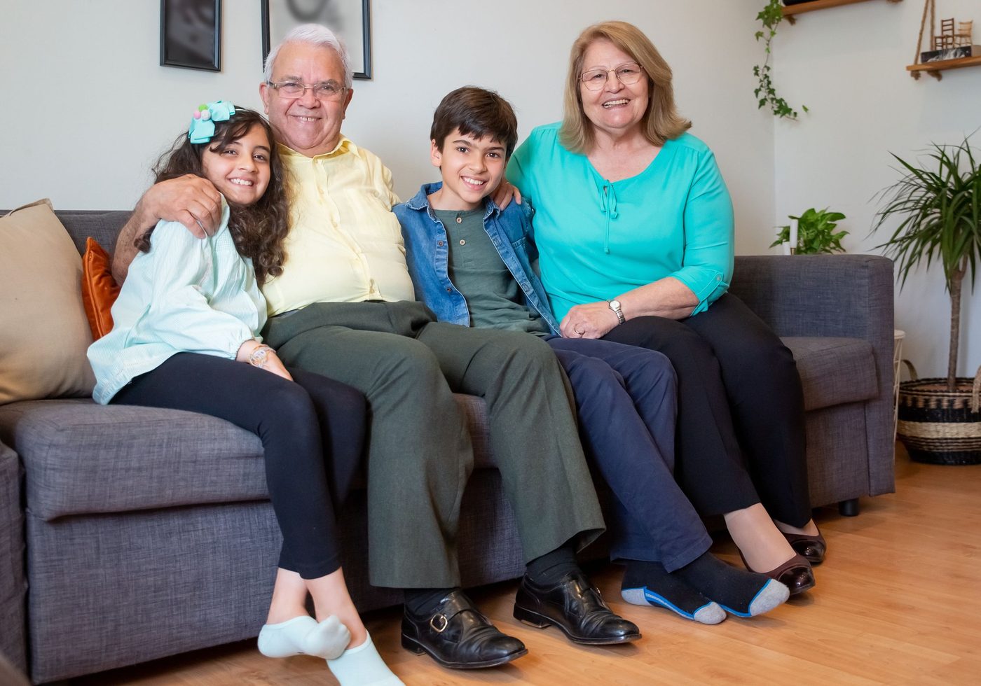 Grandparents at home with their grandchildren